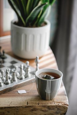 cup of tea near chess